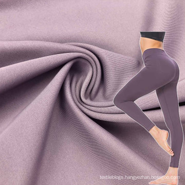 customized colors nylon 76 spandex 24 solid dyed four way stretch smooth yoga pants fabric for sportswear